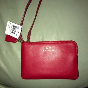 Coach red leather. Wristlet brand new with tags